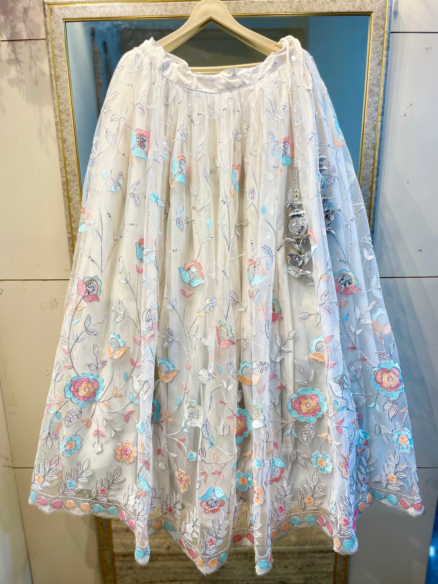 Elegant White Net Embroidered Lehenga Choli with Colorful Floral Detailing – Festive & Wedding Wear