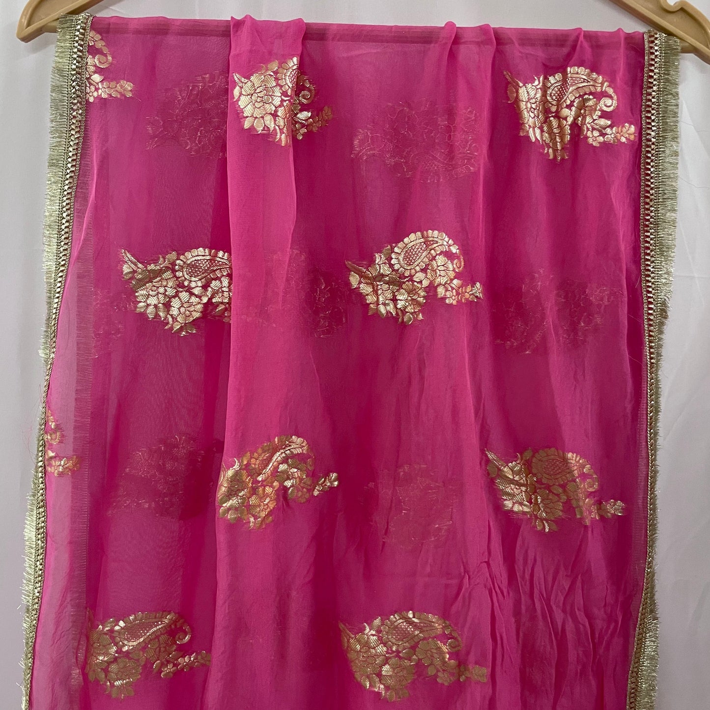 Pink anarkali salwar kameez suit designed with embroidered tissue fabric
