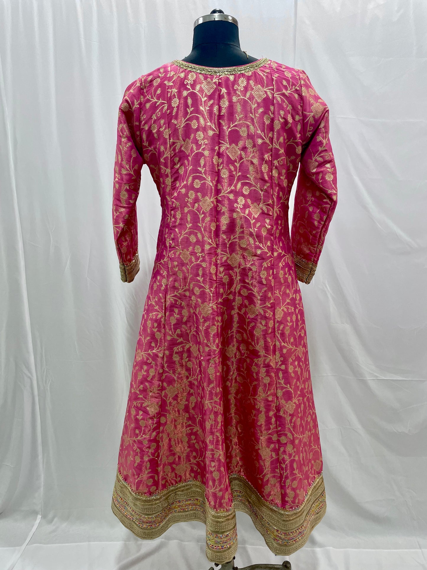 Pink anarkali salwar kameez suit designed with embroidered tissue fabric