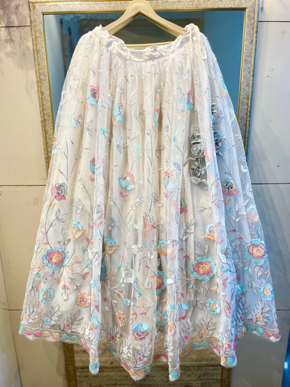Elegant White Net Embroidered Lehenga Choli with Colorful Floral Detailing – Festive & Wedding Wear